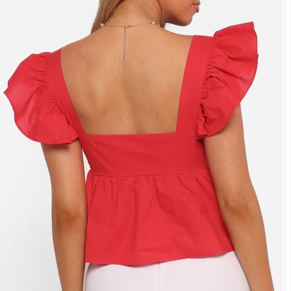 Lyric Ruffle Cotton Babydoll Top
Petal & Pup red - Picture 2 of 5